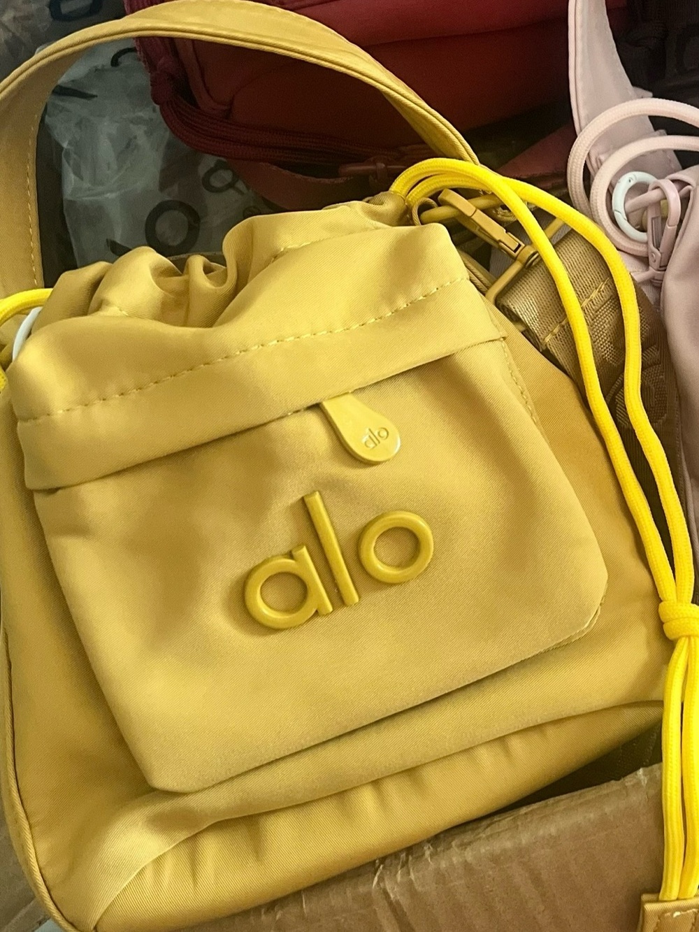ALO Yoga Yellow Drawstring Mini Bag with Front Pocket